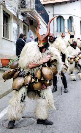 Orani, Sardinia - February 17, 2013: Parade of traditional masks of Sardinia at the Carnival of 17 February 2013 Orani, Sardinia.のeditorial素材