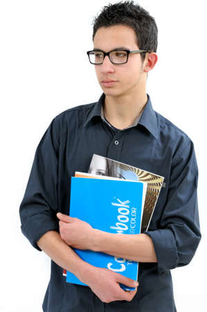 Student with notebooks and books photographed on white background.