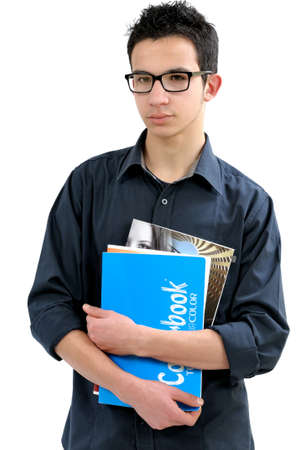 Student with notebooks and books photographed on white background.の写真素材
