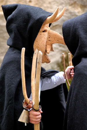 Orani, Sardinia, Italy - February 15, 2015: Parade of traditional masks of Sardinia during the Carnival 2015 in Orani.のeditorial素材