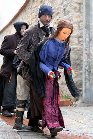 Orani, Sardinia, Italy - February 15, 2015: Parade of traditional masks of Sardinia during the Carnival 2015 in Orani.のeditorial素材