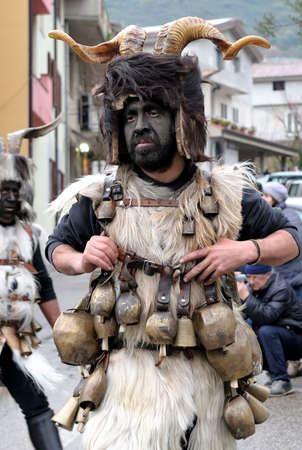 Orani, Sardinia, Italy - February 15, 2015: Parade of traditional masks of Sardinia during the Carnival 2015 in Orani.のeditorial素材