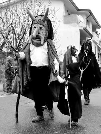 Orani, Sardinia, Italy - February 15, 2015: Parade of traditional masks of Sardinia during the Carnival 2015 in Orani.のeditorial素材