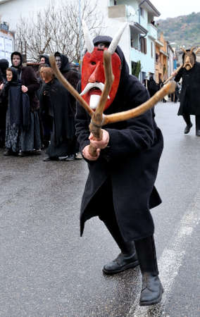 Orani, Sardinia, Italy - February 15, 2015: Parade of traditional masks of Sardinia during the Carnival 2015 in Orani.のeditorial素材