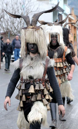 Orani, Sardinia, Italy - February 15, 2015: Parade of traditional masks of Sardinia during the Carnival 2015 in Orani.のeditorial素材