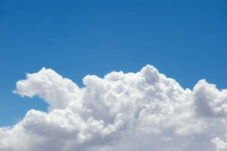 Picture of cumulonimbus clouds on a blue sky on a warm summer afternoonの写真素材