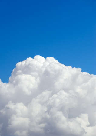 Picture of cumulonimbus clouds on a blue sky on a warm summer afternoonの写真素材