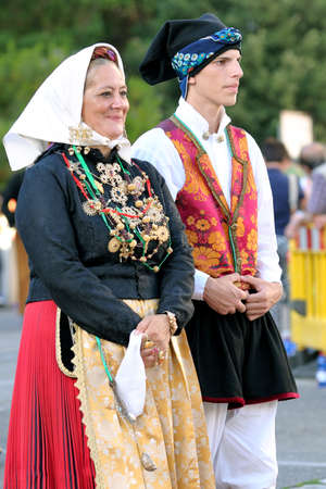 Nuoro, Sardinia, Italy - August 23, 2015: Parade of traditional costumes of Sardinia on the occasion of the Feast of the Redeemer of the Aug. 23, 2015 in Nuoro, Sardinia.のeditorial素材