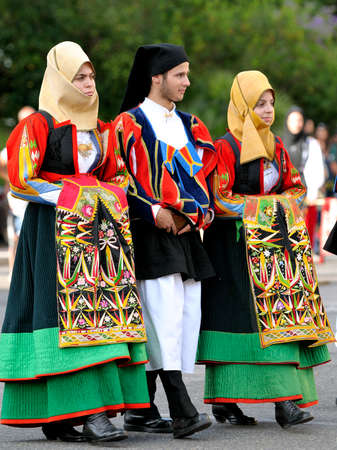 Nuoro, Sardinia, Italy - August 23, 2015: Parade of traditional costumes of Sardinia on the occasion of the Feast of the Redeemer of the Aug. 23, 2015 in Nuoro, Sardinia.のeditorial素材