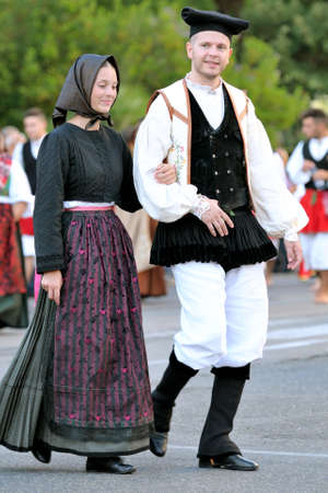 Nuoro, Sardinia, Italy - August 23, 2015: Parade of traditional costumes of Sardinia on the occasion of the Feast of the Redeemer of the Aug. 23, 2015 in Nuoro, Sardinia.のeditorial素材