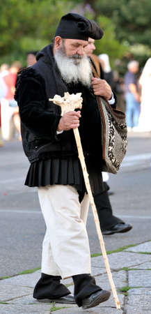 Nuoro, Sardinia, Italy - August 23, 2015: Parade of traditional costumes of Sardinia on the occasion...