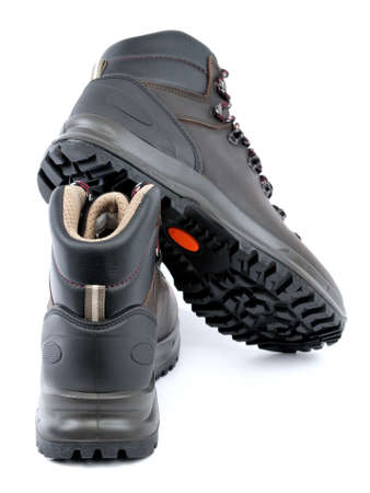 Waterproof Trekking shoes men's leather brown on white background.