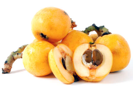 Medlars produced with organic cultivation photograph on a white backgroundの写真素材