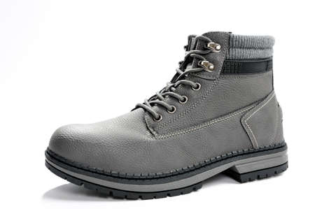 Closeup of beautiful and comfortable winter men's shoes from isolated on white background.の写真素材