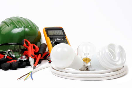 Safety equipment, work tools and components for a residential electrical installation, photographed on a white background.の写真素材