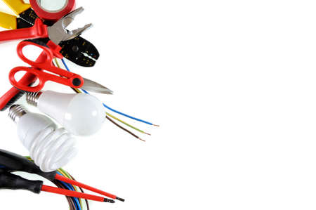 Close-up of work tools and electrical equipment on a white background with space for text / announcement.の写真素材