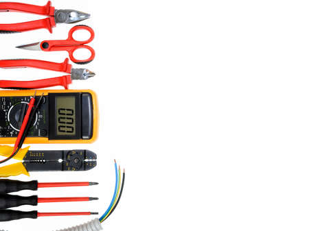 Close up of work tools for residential electrical installation isolated on white background. Space for text / announcementの写真素材