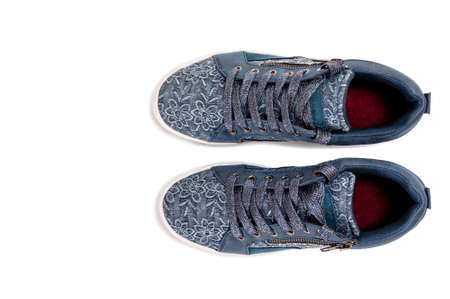 Top view of girl's shoes for leisure photographed on white background.の写真素材