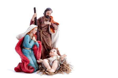 Christmas nativity scene. Baby Jesus in the manger with Mary and Joseph isolated on white...