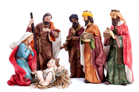 Christmas nativity scene. Baby Jesus in the manger with Mary, Joseph and the three wise men isolated on white background.の写真素材