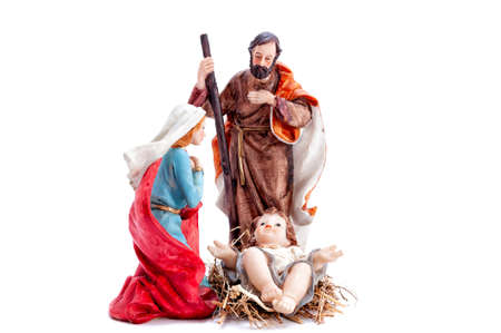 Christmas nativity scene. Baby Jesus in the manger with Mary and Joseph isolated on white background.の写真素材