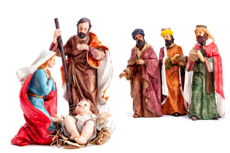 Christmas nativity scene. Baby Jesus in the manger with Mary, Joseph and the three wise men isolated on white background.の写真素材