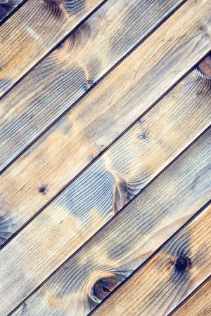 Texture of the boards of an old wooden table in antique colors. Vintage rustic wooden background.の写真素材