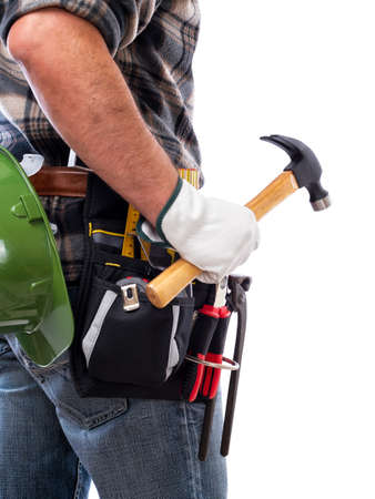 Rear view of a carpenter isolated on a white background; he wears leather work gloves, he is holding a carpenterâs hammer. Work tools industry construction and do it yourself housework. Stock photography.の写真素材