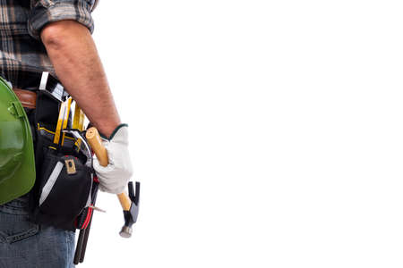 Rear view of a carpenter isolated on a white background; he wears leather work gloves, he is holding a carpenterâs hammer. Work tools industry construction and do it yourself housework. Stock photography.の写真素材