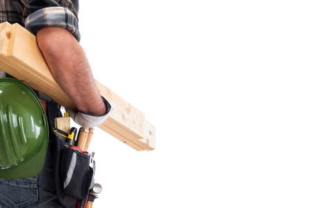 Rear view of a carpenter isolated on a white background; he wears leather work gloves, he is holding...