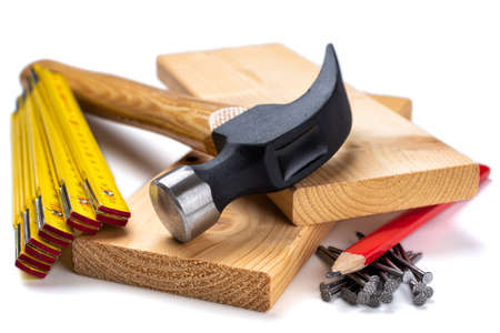 Close-up of hammer and carpenter's tools on a white background. Construction industry, do it yourself.の写真素材