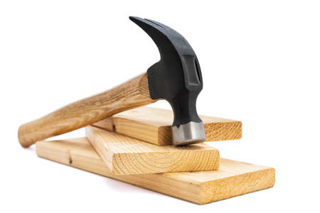 Close-up of a carpenter's hammer on white background. Construction industry, do it yourself. の写真素材