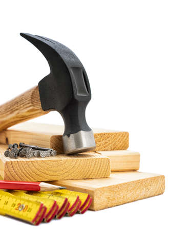 Close-up of hammer and carpenter's tools on a white background. Construction industry, do it yourself. の写真素材