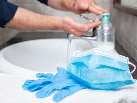 Hand washing with hot soapy water, the use of the mask and gloves stops the infection from Covid-19.