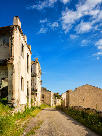 Ruined houses in the ghost village of Old Gairo, destroyed by the 1951 flood. Sardinia, Italy.の写真素材