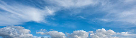 Landscape of a beautiful blue sky covered with cumulonimbus clouds on a winter afternoon. Unspoiled...