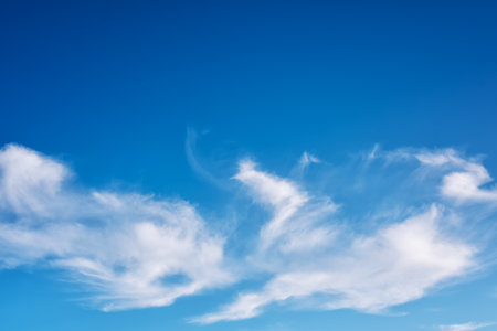 Landscape of a beautiful blue sky covered with cumulonimbus clouds on a summer afternoon. Unspoiled nature.の写真素材