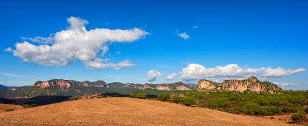 Beautiful blue sky with clouds over the limestone formations of Ogliastra, Sardinian dolomite formations. Nature of an unspoiled landscape.の写真素材