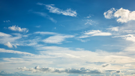 Landscape of a beautiful blue sky covered with cumulonimbus clouds on a summer afternoon. Unspoiled nature.の写真素材
