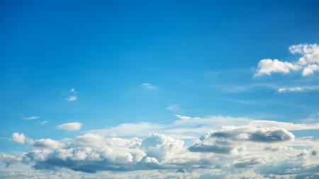 Landscape of a beautiful blue sky covered with cumulonimbus clouds on a summer afternoon. Unspoiled nature.の写真素材
