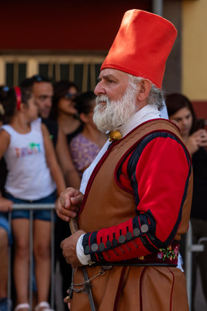 Nuoro, Sardinia, Italy - August 27, 2023: Parade of traditional costumes of Sardinia on the occasion...