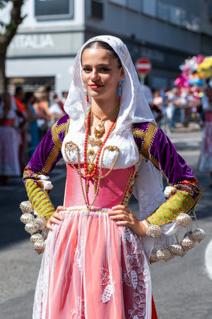 Nuoro, Sardinia, Italy - August 27, 2023: Parade of traditional costumes of Sardinia on the occasion of the Feast of the Redeemer of the August 27, 2023 in Nuoro, Sardinia.のeditorial素材