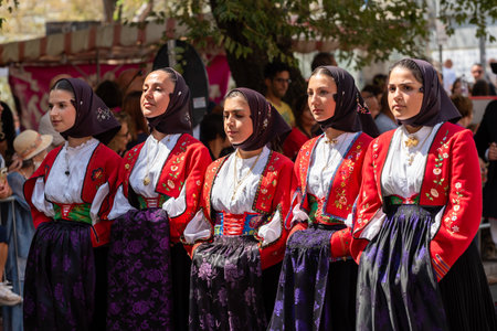 Nuoro, Sardinia, Italy - August 27, 2023: Parade of traditional costumes of Sardinia on the occasion of the Feast of the Redeemer of the August 27, 2023 in Nuoro, Sardinia.のeditorial素材