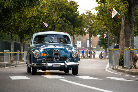 DESENZANO DEL GARDA, BRESCIA, ITALY - 4 OCTOBER 2020: ALFA ROMEO 1900 SUPER TI (1956) an old racing car in Mille Miglia 2020, a famous and vintage italian historical raceのeditorial素材