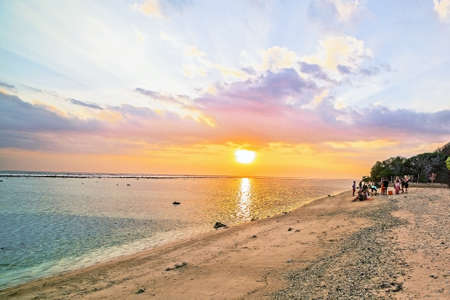 Gili Trawangan tropical island coral beach at scenic sunset, Indonesiaの写真素材