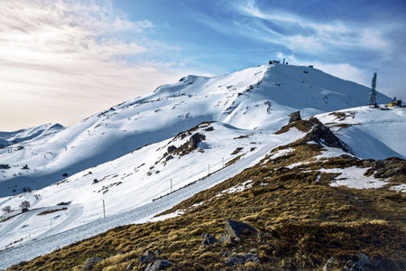 Snow-capped Cimone peak and winter hiking path, Italy, Modenaの写真素材