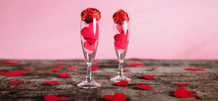 goblets of champagne with red hearts for valentines day