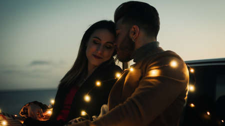 Storytelling footage of a romantic couple at sunset. Love story.の写真素材