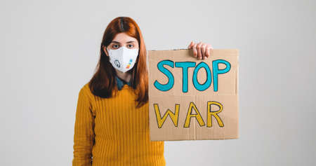 ukrainian girl holding an Stop War placard in her handの写真素材