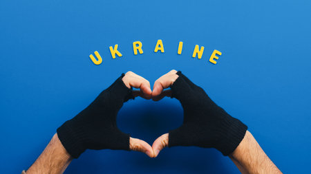 hand in the shape of a heart with Ukrainian letteringの写真素材